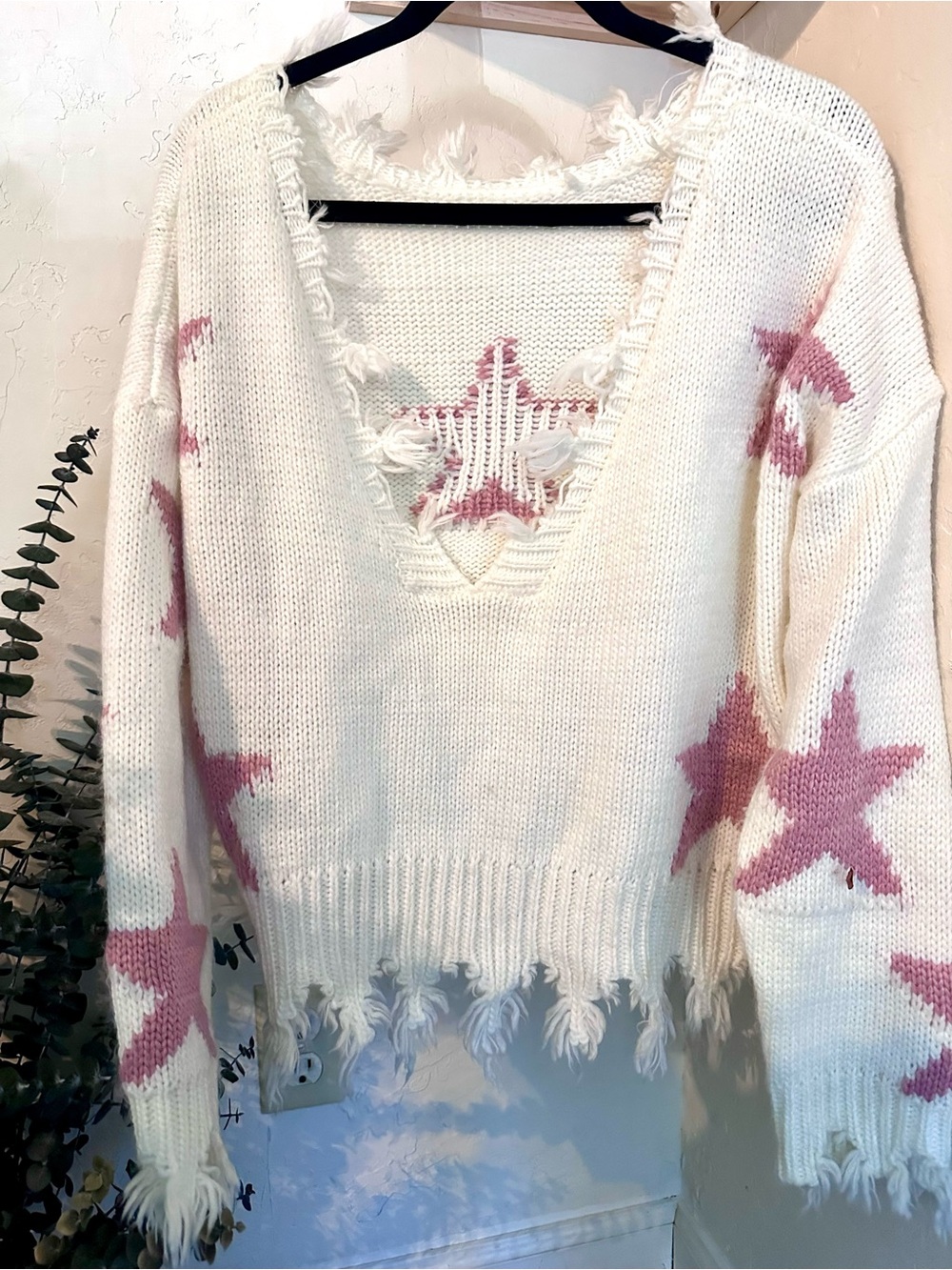 Women's Cream Star-Print Distressed V-Neck Sweater